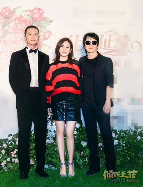 组图：郑钧刘芸亮相嫣然慈善晚宴王菲高价买郑钧倒立